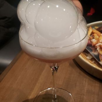 Entourage - The Weeping Angel ($14): tequila, agave nectar, egg whites, rosemary bubbles. This is a top-tier cocktail! - American Near Me - Naperville, Illinois Entourage - The Weeping Angel ($14): tequila, agave nectar, egg whites, rosemary bubbles. This is a top-tier cocktail! - American Near Me - Naperville, Illinois