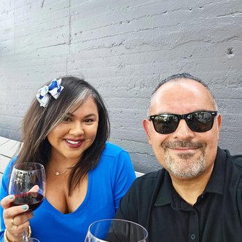 Let It Brie - Enjoying wine on the patio. - Cheese Shops Near Me - Fullerton, California