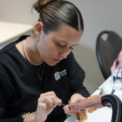 Body Pro Beauty & Aesthetics Academy - A Body Pro Beauty student developing nail application skills through focused practical training.
