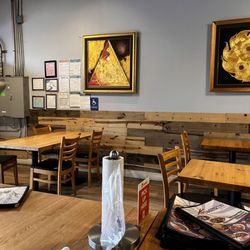 1/2 the restaurant seating area. Customers were sitting to the right- There are more tables in the back!