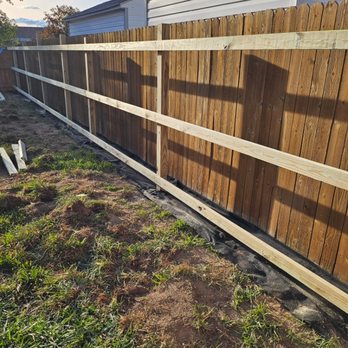 Happy Oasis Construction - Abutment fence Edition in progress rails being added the day after posts were set - Handyman Near Me Happy Oasis Construction - Abutment fence Edition in progress rails being added the day after posts were set - Handyman Near Me