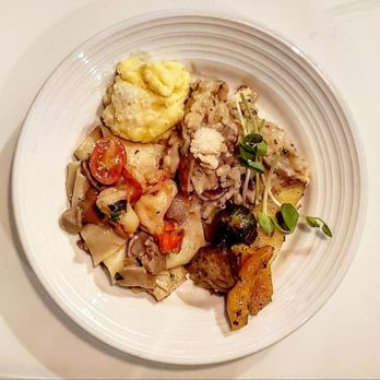 Coppi Ristorante - a plate of food on a table - Italian Near Me - Toronto, Ontario Coppi Ristorante - a plate of food on a table - Italian Near Me - Toronto, Ontario