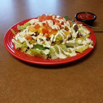 Little Devil's Lunchbox - An awesome taco salad, WITH black beans, avocado salsa, sour cream, chips, Romaine, tomato, onions and shredded beef brisket! - Mexican Near Me - Port Angeles, Washington Little Devil's Lunchbox - An awesome taco salad, WITH black beans, avocado salsa, sour cream, chips, Romaine, tomato, onions and shredded beef brisket! - Mexican Near Me - Port Angeles, Washington