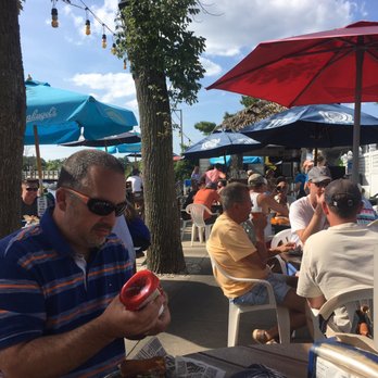 The Channel Marker - Views of outdoor seating. - New American Near Me - Syracuse, Indiana