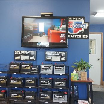 Luke's Auto Repair - Tv and batteries White door to garage - Auto Repair Near Me - Onalaska, Wisconsin