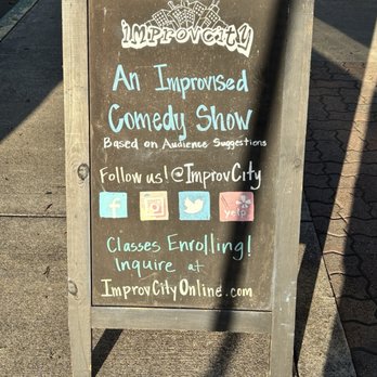 ImprovCity - Cute lil' sandwich board sharing a bit of social media for Improv City. Just go see it trust me you'll be so happy you did. - Comedy Clubs Near Me - Tustin, California