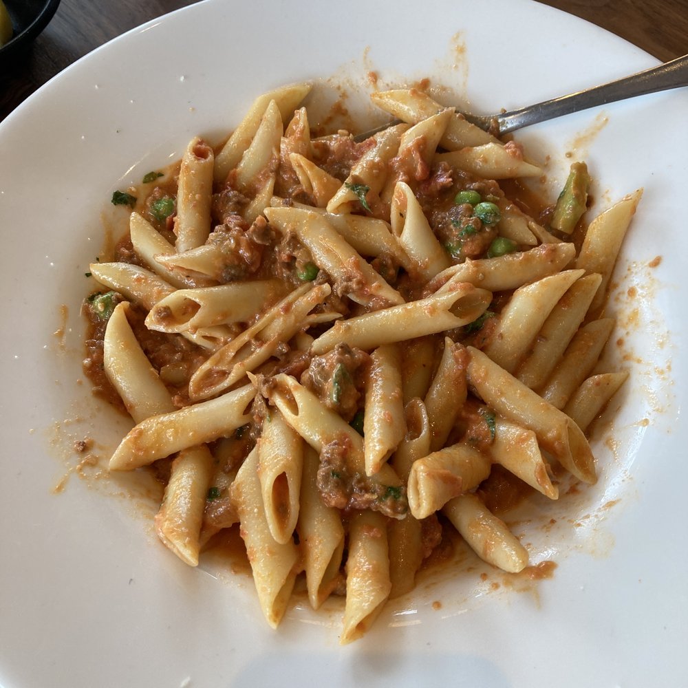Zola Bistro - penne pasta: chianti sauce, sweet italian sausage, cream, parmigiano reggiano, peas $24 - French Near Me - Ann Arbor, Michigan Zola Bistro - penne pasta: chianti sauce, sweet italian sausage, cream, parmigiano reggiano, peas $24 - French Near Me - Ann Arbor, Michigan