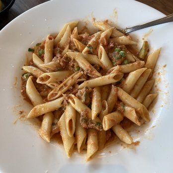 Zola Bistro - penne pasta: chianti sauce, sweet italian sausage, cream, parmigiano reggiano, peas $24 - French Near Me - Ann Arbor, Michigan Zola Bistro - penne pasta: chianti sauce, sweet italian sausage, cream, parmigiano reggiano, peas $24 - French Near Me - Ann Arbor, Michigan