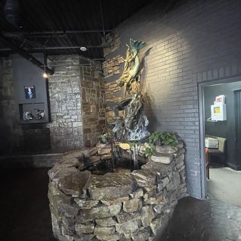 Mermaids Seafood Restaurant - a fish on a rock wall - Seafood Near Me - Rogers, Arkansas