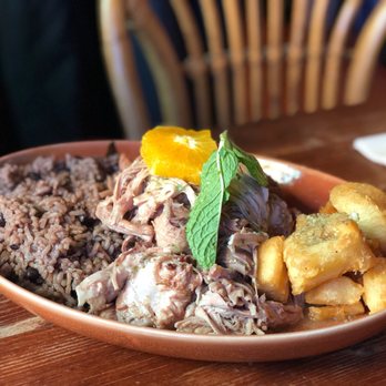 Cuban Pete's - Suckling pig The so called roasted pigin with manihot - Cuban Near Me - Montclair, New Jersey