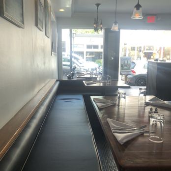 Blackfin Bistro - Long bench I'm seated on that spans the restaurant - Seafood Near Me - Key West, Florida Blackfin Bistro - Long bench I'm seated on that spans the restaurant - Seafood Near Me - Key West, Florida