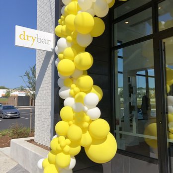 Drybar - Raleigh Midtown - Front door with pretty yellow balloons! - Blow Dry/Out Services Near Me - Raleigh, North Carolina Drybar - Raleigh Midtown - Front door with pretty yellow balloons! - Blow Dry/Out Services Near Me - Raleigh, North Carolina