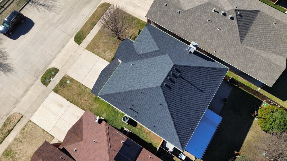 Slide of Uptown Roofing & Co