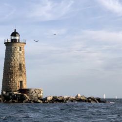 Great Salt Charters - Lighthouse with a bald eagle and seagull