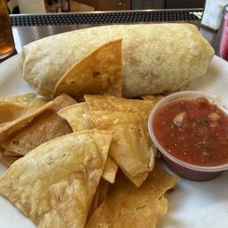 Breakfast burrito with eggs beans hashbrowns and cheese. Delicious! Breakfast burrito with eggs beans hashbrowns and cheese. Delicious!