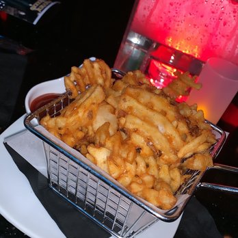 LA RAZA - Cajun Waffle Fries - New Mexican Cuisine Near Me - Woodside, New York LA RAZA - Cajun Waffle Fries - New Mexican Cuisine Near Me - Woodside, New York