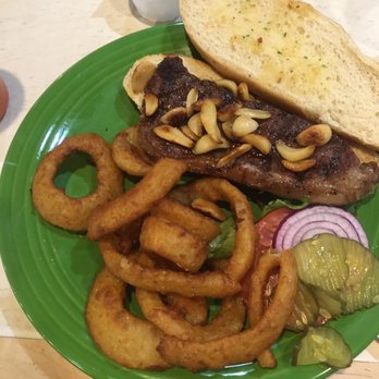 Coffee Garden - a green plate with a sandwich and onion rings - Diners Near Me - Elko, Nevada