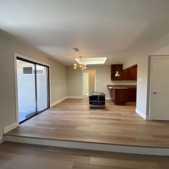 Boyenga Team - This is from the living room looking to the kitchen with the new oven to install the buyers loved the new floors - Real Estate Agents Near Me - Los Gatos, California