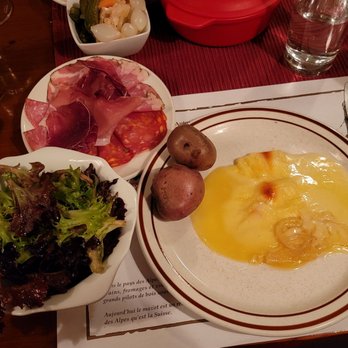 Restaurant Au Mazot Suisse - Raclette with potatoes, charcuterie and salad. - Restaurants Near Me - Val-Morin, Quebec Restaurant Au Mazot Suisse - Raclette with potatoes, charcuterie and salad. - Restaurants Near Me - Val-Morin, Quebec