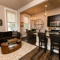 Guests in suite 202 should be prepared for a tasteful neutral palette with unexpected pops of color.