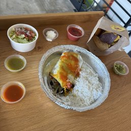 Black bean burrito with green and red sauces Black bean burrito with green and red sauces