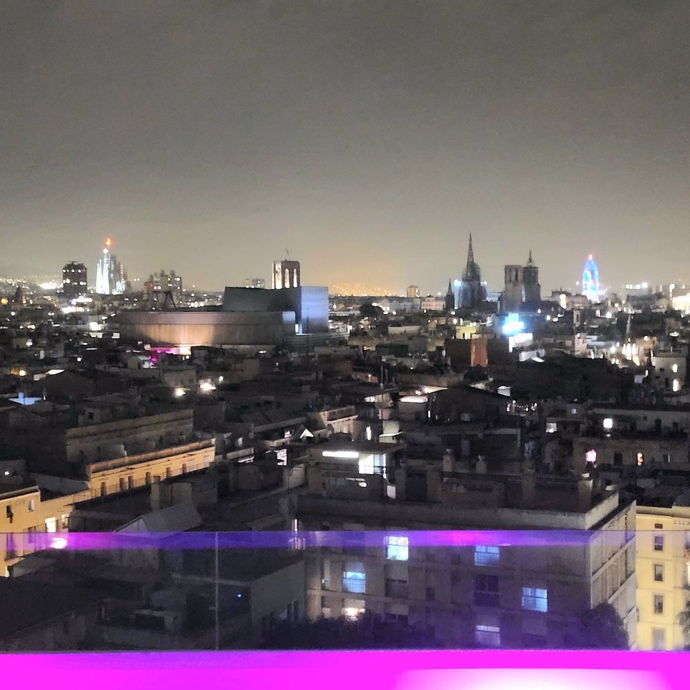 View of the pool lights and Barcelona town views.