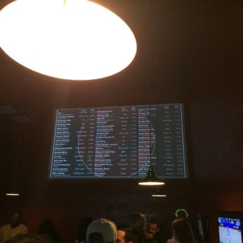 Engine No 9 - Beer menu is projected on the wall - Burgers Near Me - Saint Petersburg, Florida Engine No 9 - Beer menu is projected on the wall - Burgers Near Me - Saint Petersburg, Florida