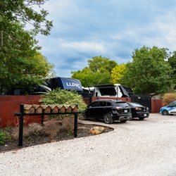 Skyline RV Park - A neighborhood feel at Skyline RV Park, with individual mailboxes, fenced RV sites, and leafy surroundings.