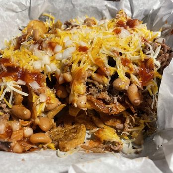 Mitch’s Texas Style Bbq - Brisket, beans on homemade potato chips topped with shredded cheese and Mitch's BBQ sauce. - Barbeque Near Me - Amarillo, Texas Mitch’s Texas Style Bbq - Brisket, beans on homemade potato chips topped with shredded cheese and Mitch's BBQ sauce. - Barbeque Near Me - Amarillo, Texas
