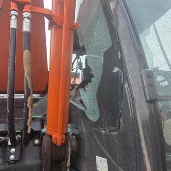 Midwest Autoglass - Broken side Glass on excavator - Auto Glass Services Near Me Midwest Autoglass - Broken side Glass on excavator - Auto Glass Services Near Me
