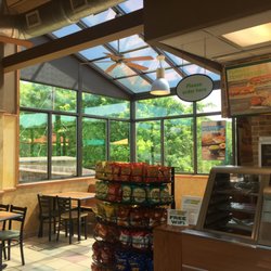 Subway - Inside the store there is a large eating area and glass enclosure with great views.