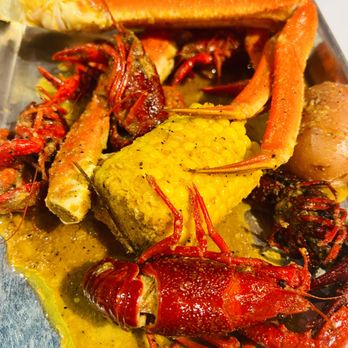 Crawfish Cafe - Boiled Snow Crab Legs with corn, crawfish, and potatoes. - Seafood Near Me - Cypress, Texas