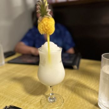 Sensei Sushi Bar & Grill - a pineapple drink with a pineapple garnish - Sushi Bars Near Me - Kapaʻa, Hawaii