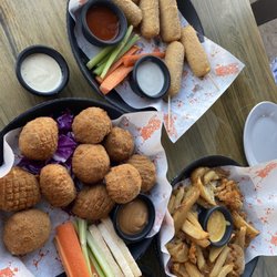 Lapa Lapa - Potato/cheese balls, dedos de queso (bland), papas y papas mix of 4 different fries and cheese sauce, very good.