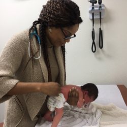 Onyinye Okezie, MD - Okezie Pediatrics - Dr. Okezie making sure our princess is healthy and strong
