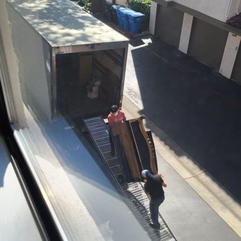 CEO Moving - loading well wrapped dresser into the truck - Movers Near Me CEO Moving - loading well wrapped dresser into the truck - Movers Near Me