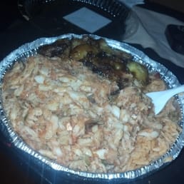 Glowing plate of Bacalao w/ rice and beans. Side of sweet plantains. Glowing plate of Bacalao w/ rice and beans. Side of sweet plantains.