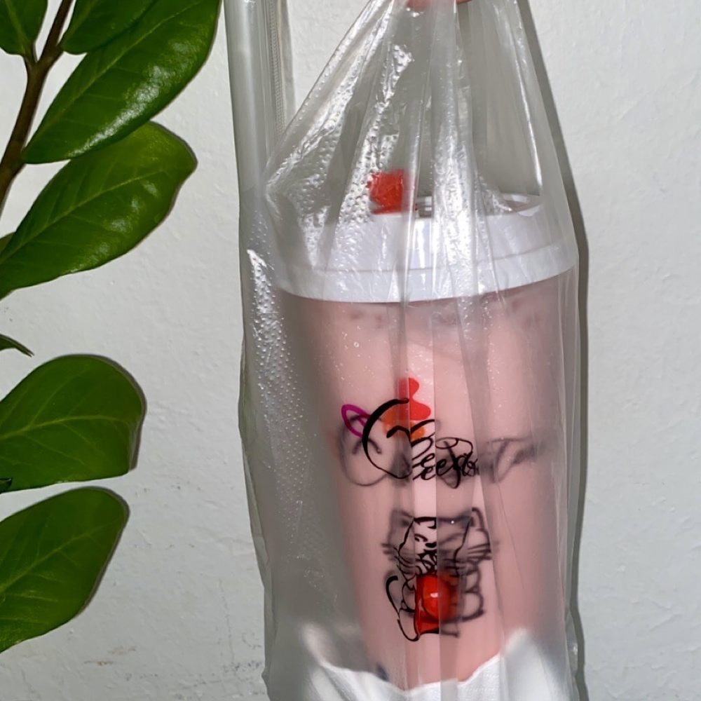 Drincup Cafe - Large Strawberry Milk Tea with 100% sweetness and boba inside the cute bag packaging! - Bubble Tea Near Me - Honolulu, Hawaii Drincup Cafe - Large Strawberry Milk Tea with 100% sweetness and boba inside the cute bag packaging! - Bubble Tea Near Me - Honolulu, Hawaii