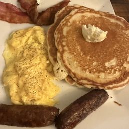 Lili 2 Pancakes, 2 Sausage Links, and 2 Strips of Bacon Lili 2 Pancakes, 2 Sausage Links, and 2 Strips of Bacon