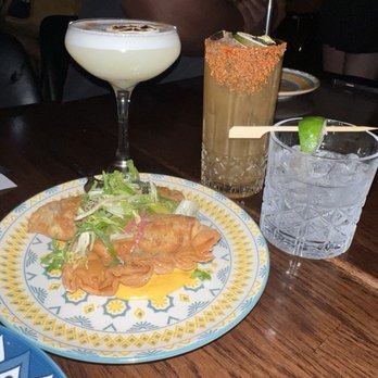 Pulpo Kitchen + Lounge - Duck Confit Empanadas + drinks | 4/10/2026 - Salad Near Me - St. Petersburg, Florida Pulpo Kitchen + Lounge - Duck Confit Empanadas + drinks | 4/10/2026 - Salad Near Me - St. Petersburg, Florida