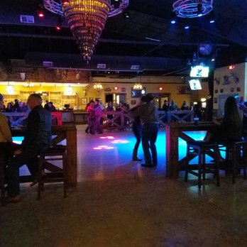 Whiskey River West - Lonestar beer chandelier and dance floor - Country Dance Halls Near Me - Richmond, Texas