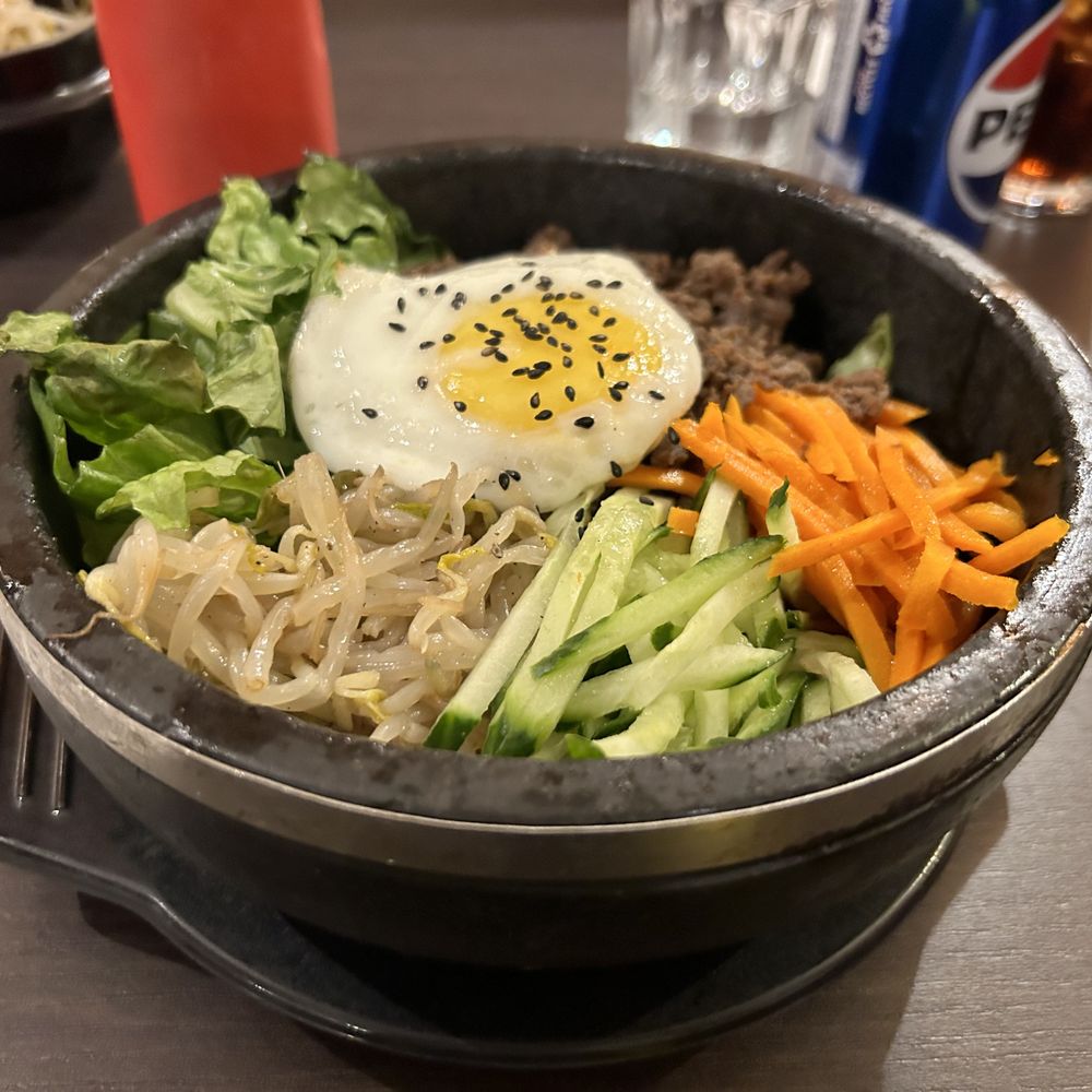 Kimchi House - My bi bim bap was alright. The rice was a bit soggy so it got stuck to the sizzingly clay pot. Not the most pleasant texture TBH. - Korean Near Me - Jasper, Alberta Kimchi House - My bi bim bap was alright. The rice was a bit soggy so it got stuck to the sizzingly clay pot. Not the most pleasant texture TBH. - Korean Near Me - Jasper, Alberta
