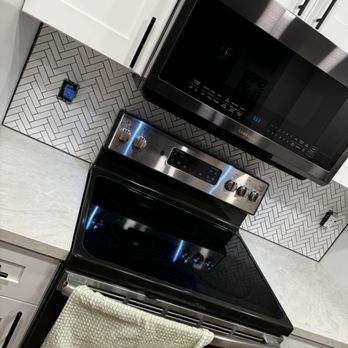 Cris Tile & Stone - Herringbone splash - Tiling Near Me