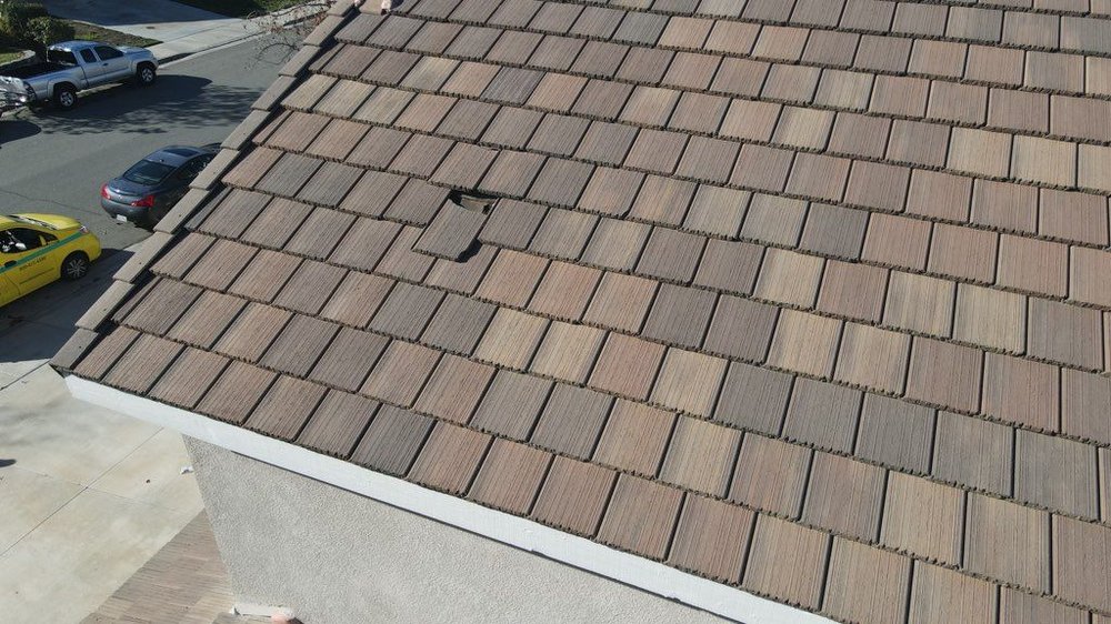 Slide of GCi Roofing