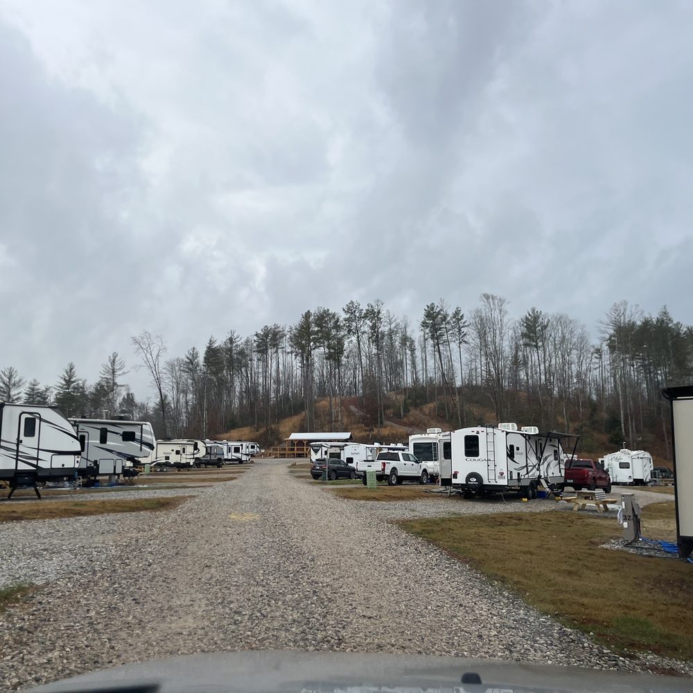River Pointe RV Park & Campground - Long range view as you enter park. 5mph in park. Plenty of dog waste stations for campers convenience. - RV Parks Near Me - Morganton, North Carolina River Pointe RV Park & Campground - Long range view as you enter park. 5mph in park. Plenty of dog waste stations for campers convenience. - RV Parks Near Me - Morganton, North Carolina