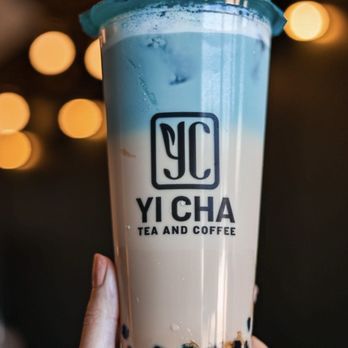 YI CHA - Tea and Coffee - a hand holding a cup of tea - Coffee & Tea Near Me - Spring, Texas YI CHA - Tea and Coffee - a hand holding a cup of tea - Coffee & Tea Near Me - Spring, Texas