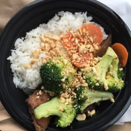 Pork with jasmine rice broccoli and peanuts. Pork with jasmine rice broccoli and peanuts.