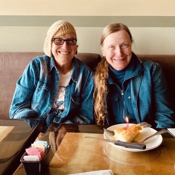 Gyrolicious - My wife and her sister enjoying a surprise birthday cake slice. - Greek Near Me - Jericho, New York