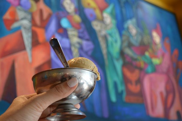 Photo of Gelatiamo - Seattle, WA, US. a hand holding a bowl of ice cream