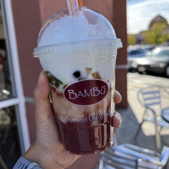 BAMBU - a hand holding a cup of coffee - Bubble Tea Near Me - Sacramento, California